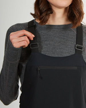 Close-up of the suspender adjuster and chest pocket on the black XTM Stellar 2.0