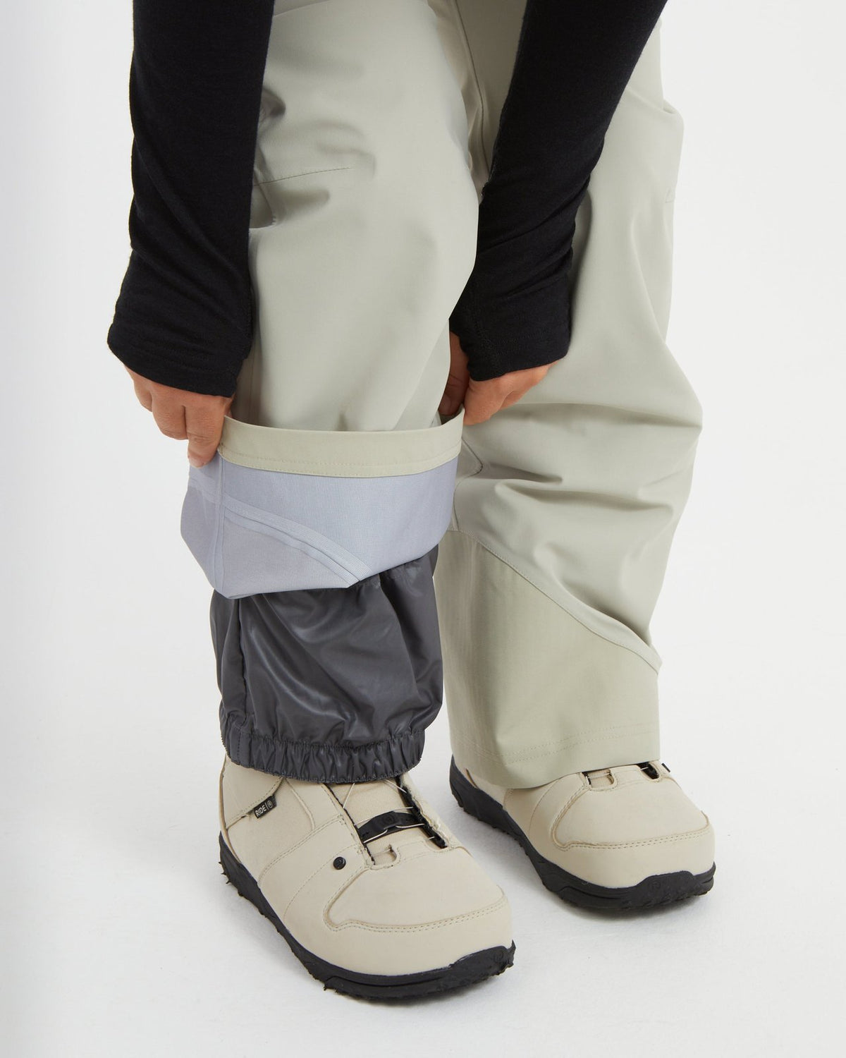 Stone Grey XTM Stellar 2.0 cuff rolled up to show the elasticised boot gaiter