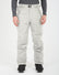 XTM Glide men's ski pant in Stone Grey, front view worn with snowboard boots