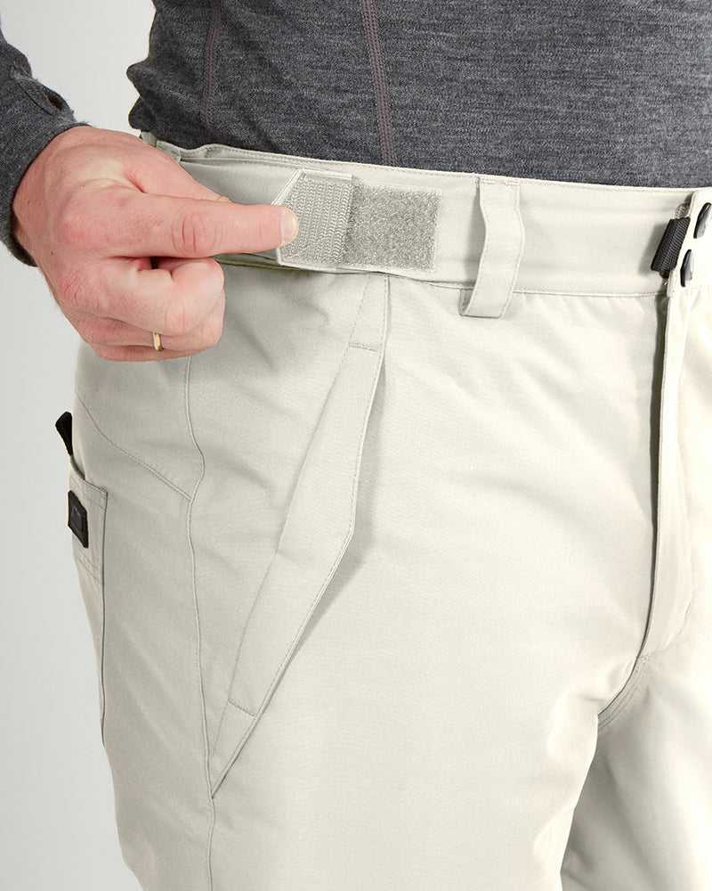 Close-up of the velcro waist adjuster on the Stone Grey XTM Glide ski pant