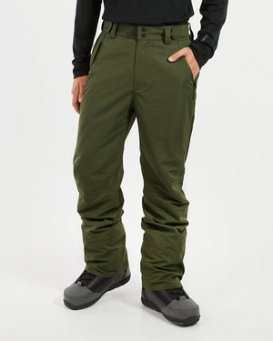 XTM Glide men's ski pant in Evergreen, front view with a hand in the pocket