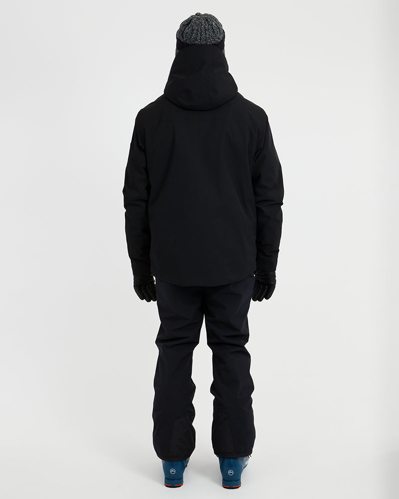 Back view of the Black XTM Quantum snow jacket with the hood down