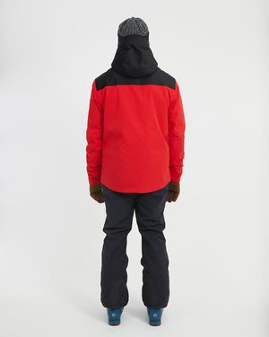 Back view of the Crimson Red XTM Quantum snow jacket with black yoke and hood