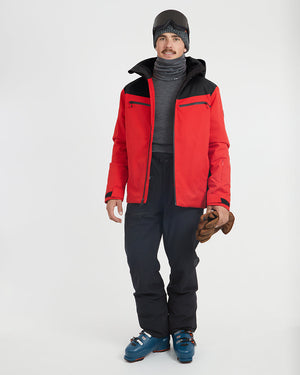 Crimson Red XTM Quantum snow jacket worn open over a base layer, full-length view