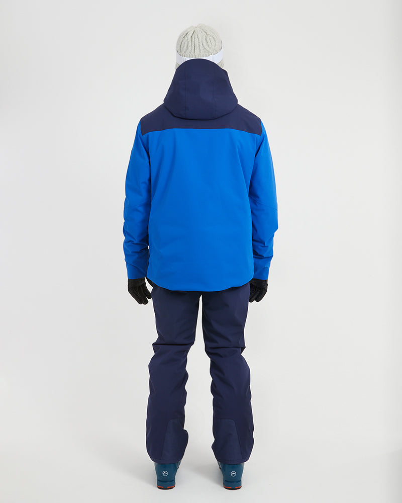 Back view of the Marine Blue XTM Quantum snow jacket with the navy hood down