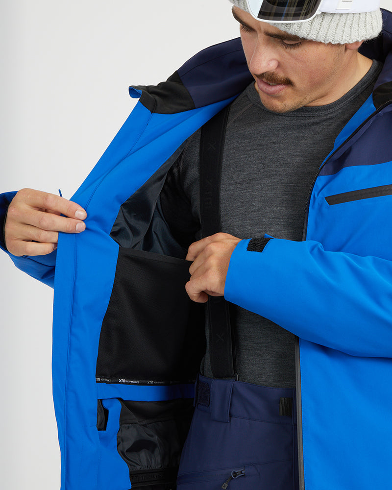 Marine Blue XTM Quantum jacket opened to show the internal zip pocket