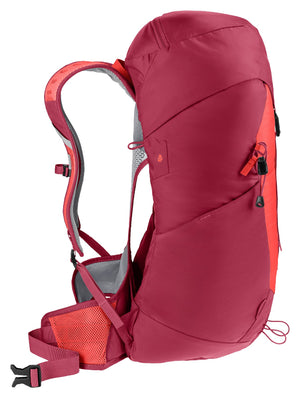 Side profile of the Deuter AC Lite 30 in Cherry Masala with the arched mesh back