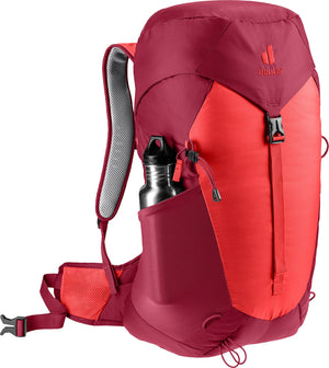 Deuter AC Lite 30 in Cherry Masala carrying a drink bottle in the side pocket