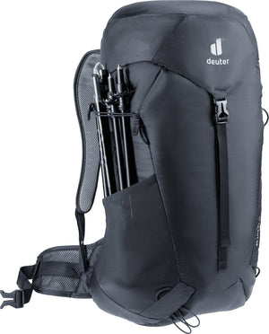Deuter AC Lite 32 EL with folded trekking poles stowed down the side