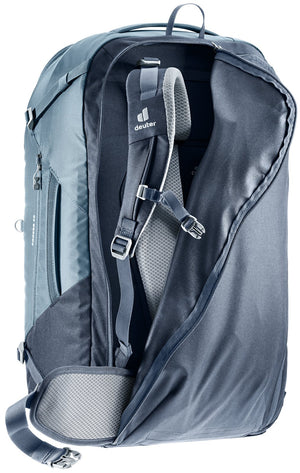Deuter Access 55 in Atlantic Ink with the harness cover half zipped over the straps