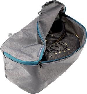Deuter Access 55 shoe compartment unzipped with a pair of hiking shoes inside