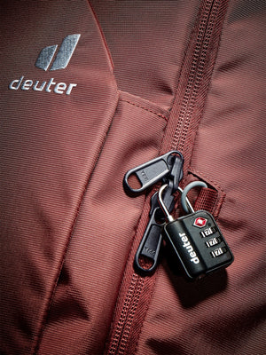 Close-up of the lockable zip on the Deuter Access Pro 60 SL in Caspia Raisin, padlock sold separately