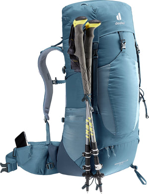 Deuter Aircontact Lite 40 + 10 in Atlantic Ink with trekking poles stowed on the pole attachment