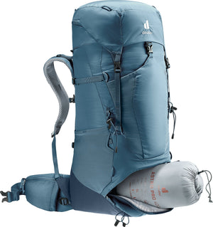 Deuter Aircontact Lite 50 + 10 in Atlantic Ink with a sleeping bag in the lower section, zip opened