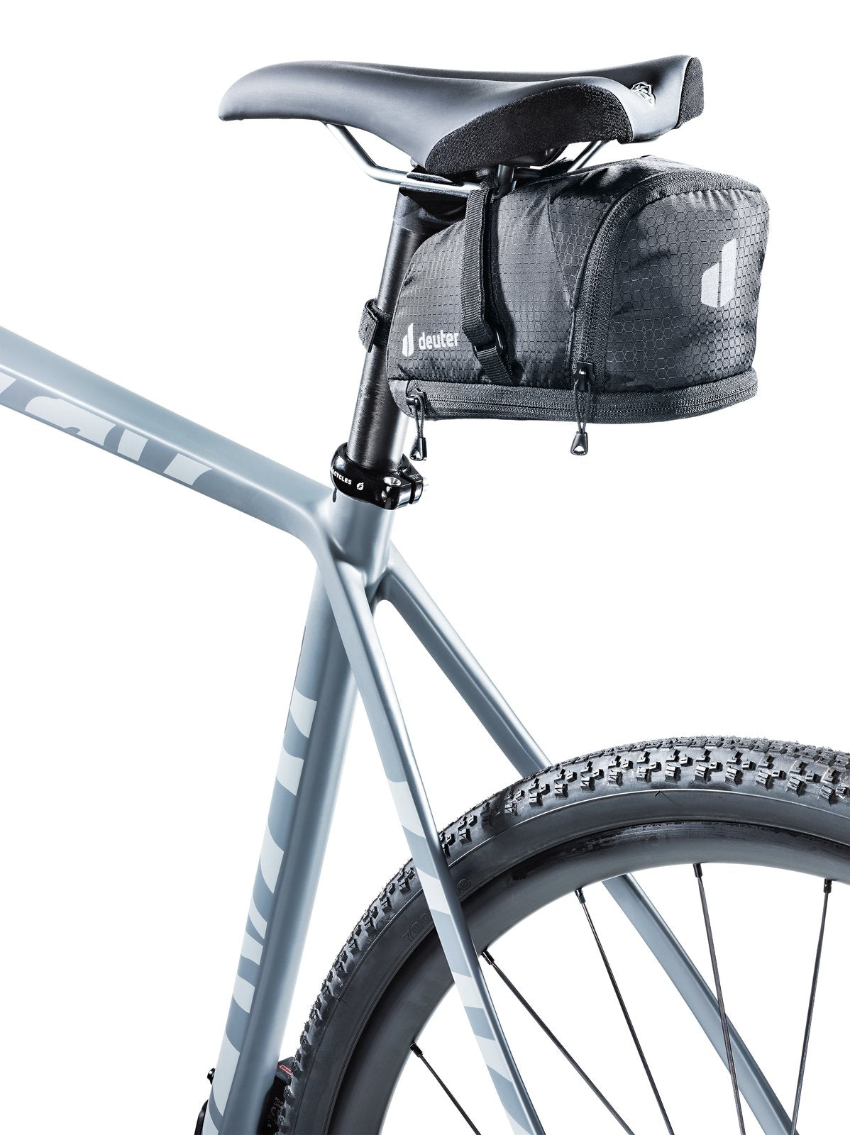 Deuter Bike Bag 1.1 + 0.3 in black mounted under the saddle of a grey gravel bike