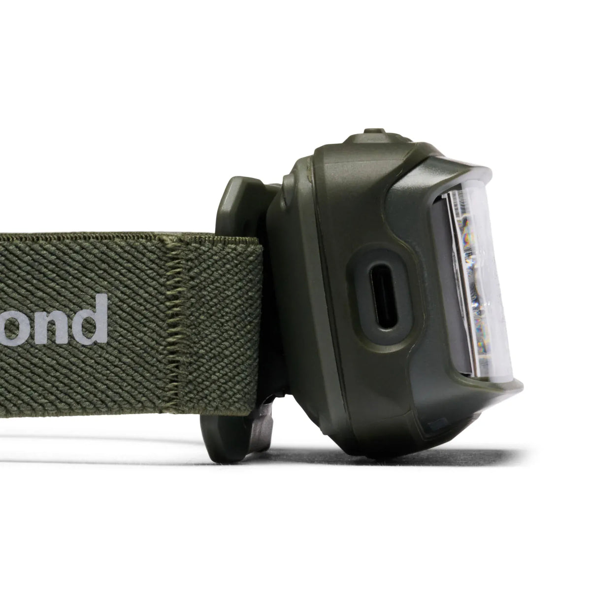 Right side of the Black Diamond Storm in Tundra showing the charging port cover