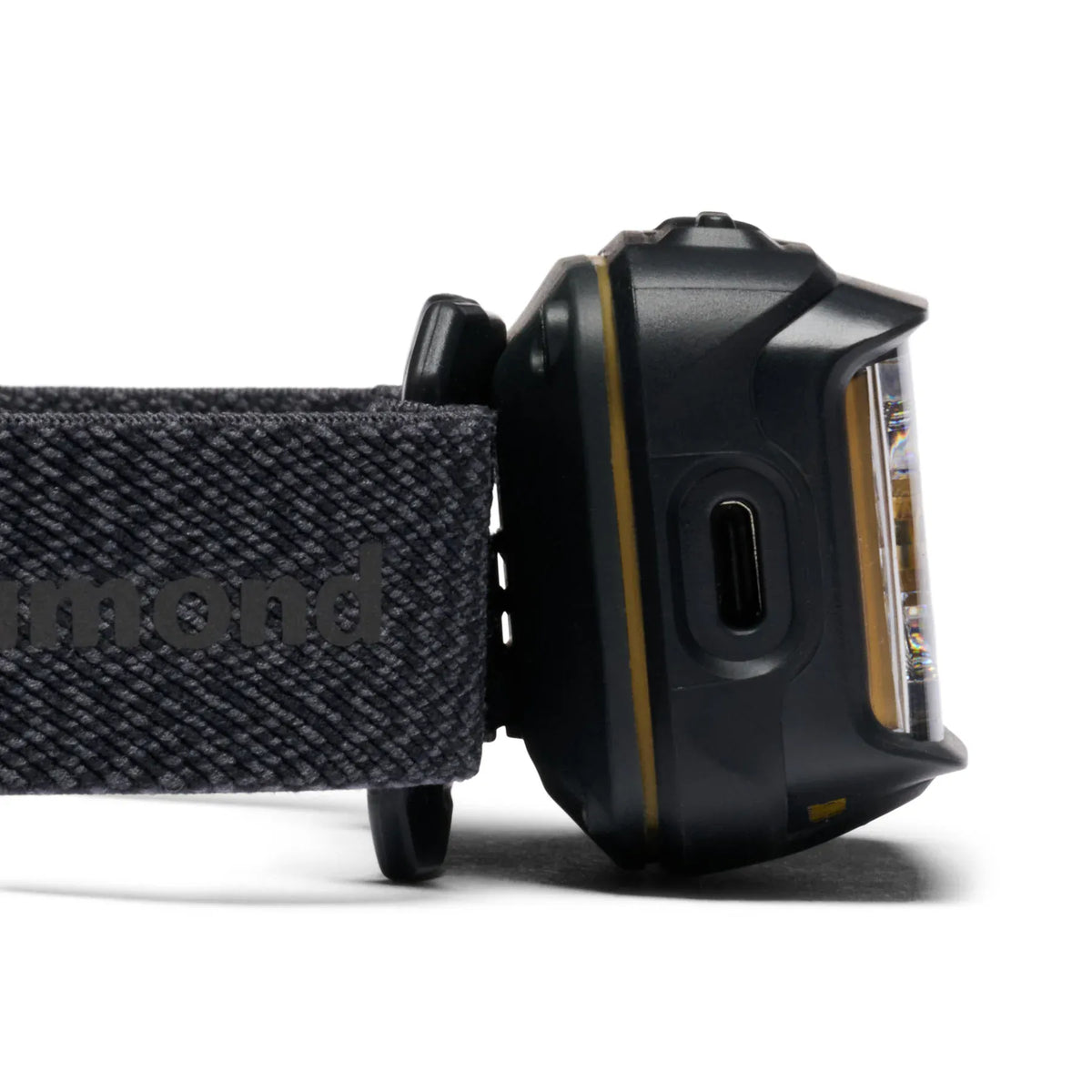 Side view of the Black Diamond Storm+ in Black with the port cover