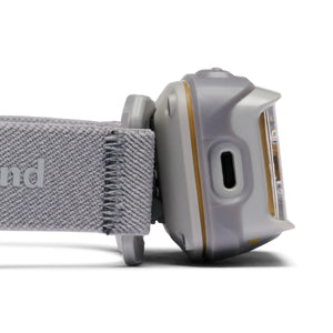 Side of the Black Diamond Storm+ in Pewter showing the charging port cover