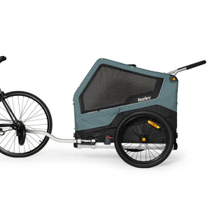 Burley Bark Ranger XL hitched behind a bicycle, side view