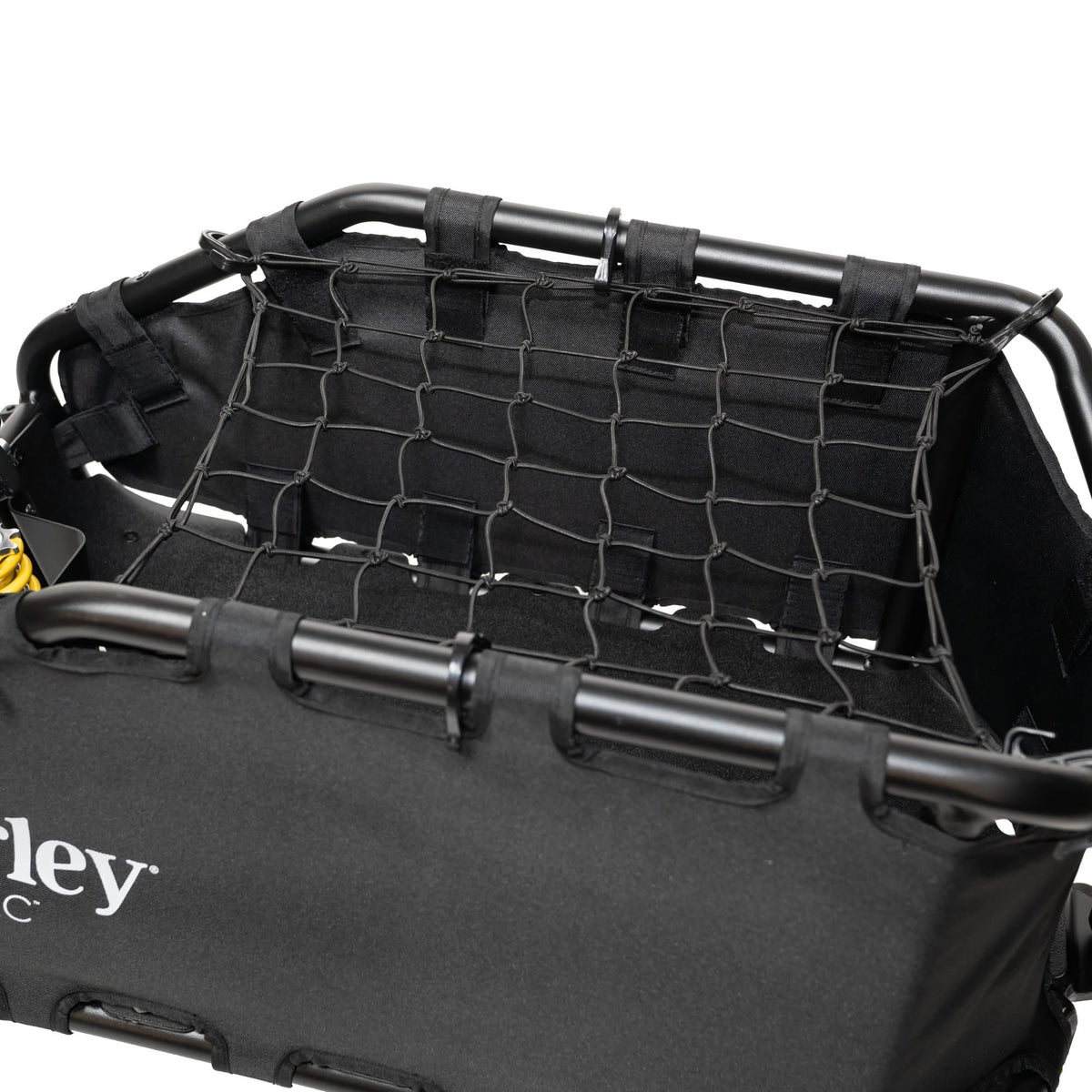 Burley Coho XC cargo bay with the black bungee net stretched across the frame