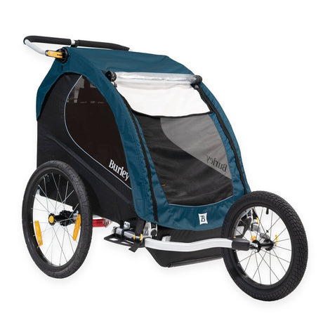 Blue Burley double kid trailer converted to a jogging stroller with the Jogger Kit front wheel fitted