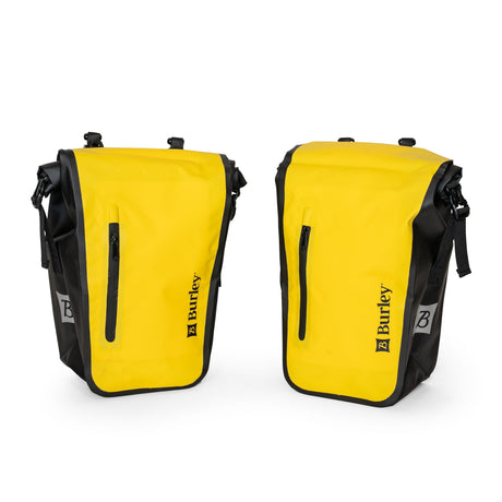 Burley Pannier Set, two yellow and black roll-top panniers with Burley logo and external zip pocket