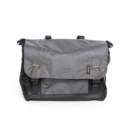 Burley Upper Market Bag in grey with black base and mesh sides, front flap closed with two buckles