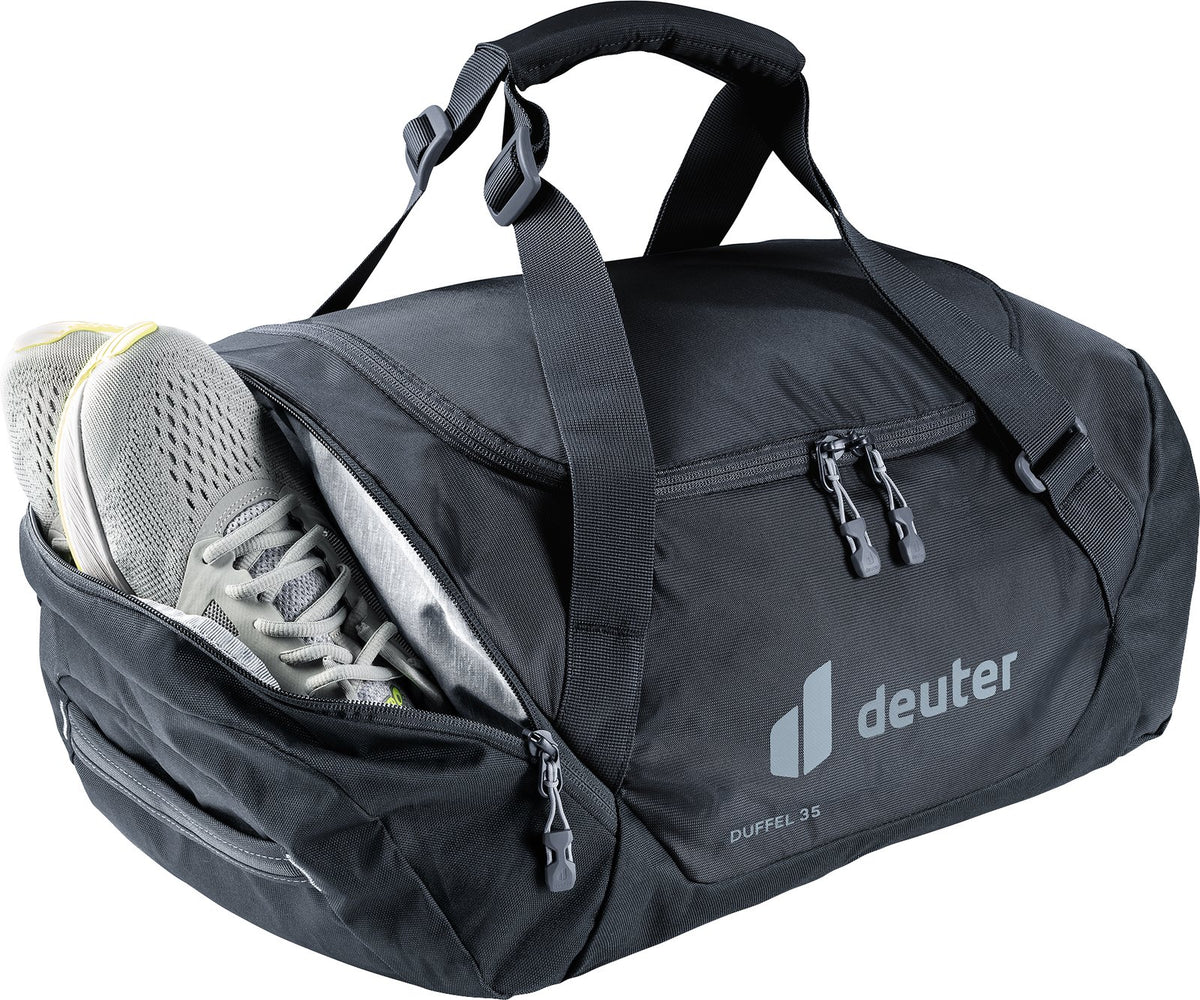 Deuter Duffel 35 with a pair of sneakers in the zipped end pocket