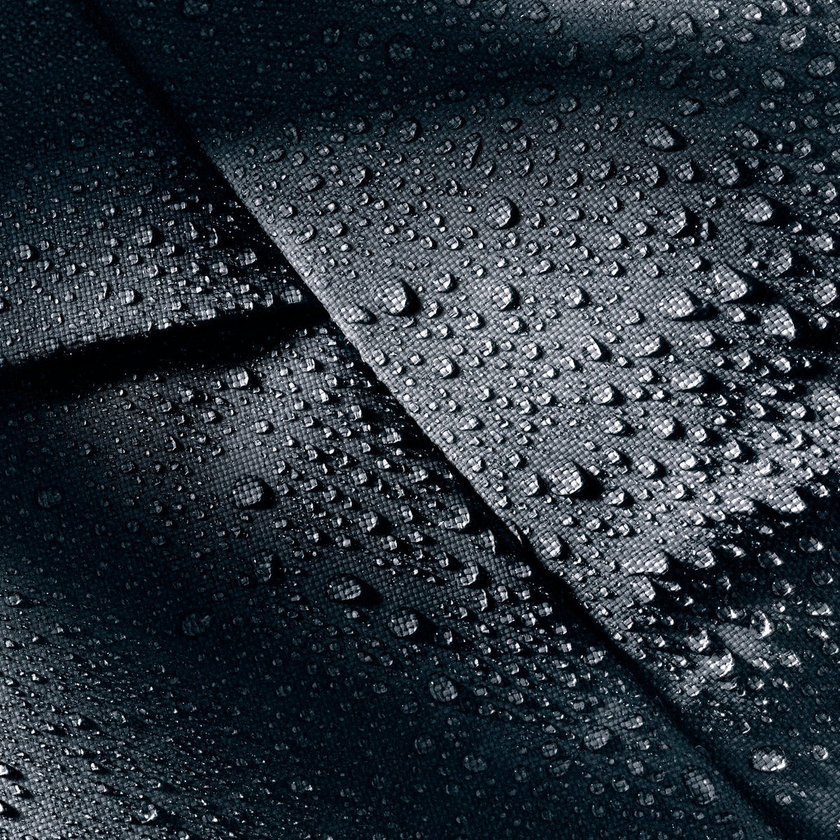 Close-up of water beading on the Deuter Duffel Pro 60's TPU-coated fabric