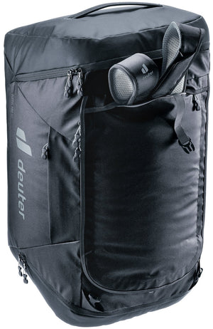 Deuter Duffel Pro 60 in Black stood on end with shoes poking out of the end pocket