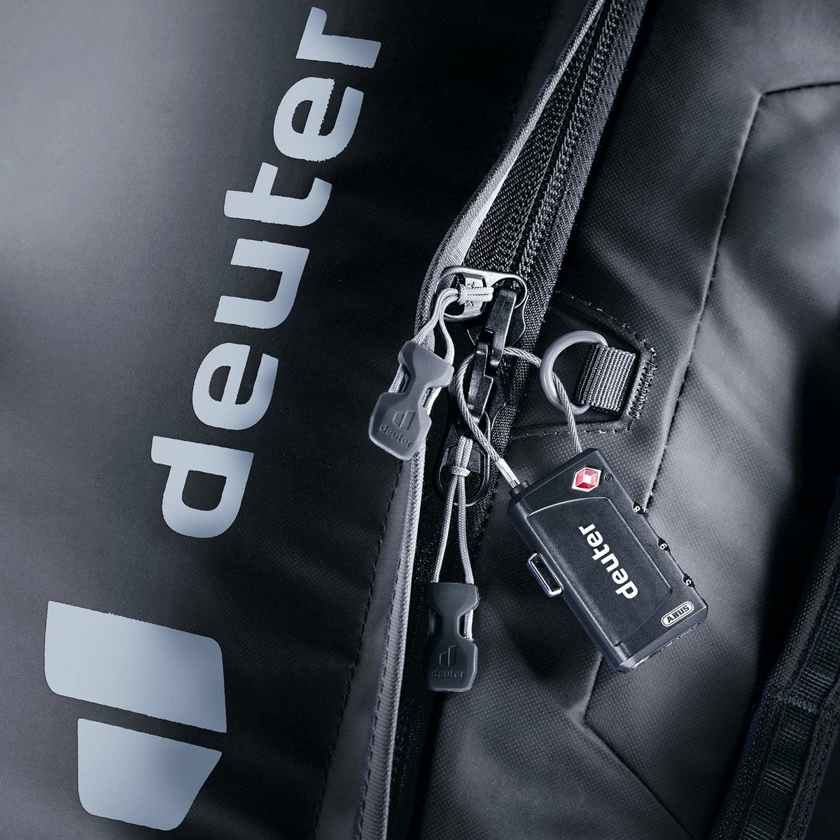 Close-up of the Deuter Duffel Pro Movo 36 main zip secured with a padlock (not included)