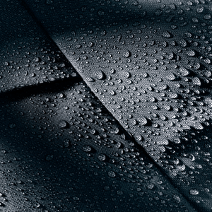 Close-up of water beading on the Deuter Duffel Pro Movo 90 TPU-coated fabric