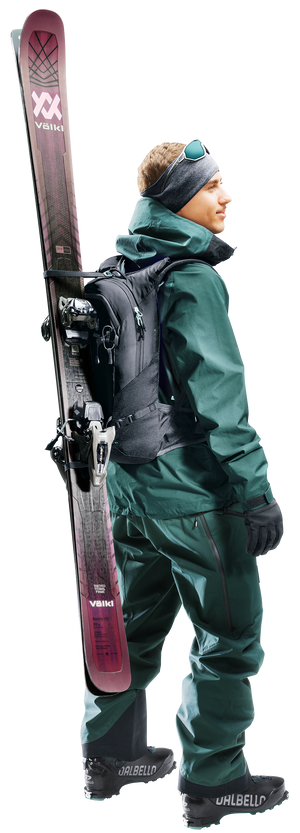 Deuter Freecline 15 worn by a skier with a pair of skis strapped upright to the side of the pack