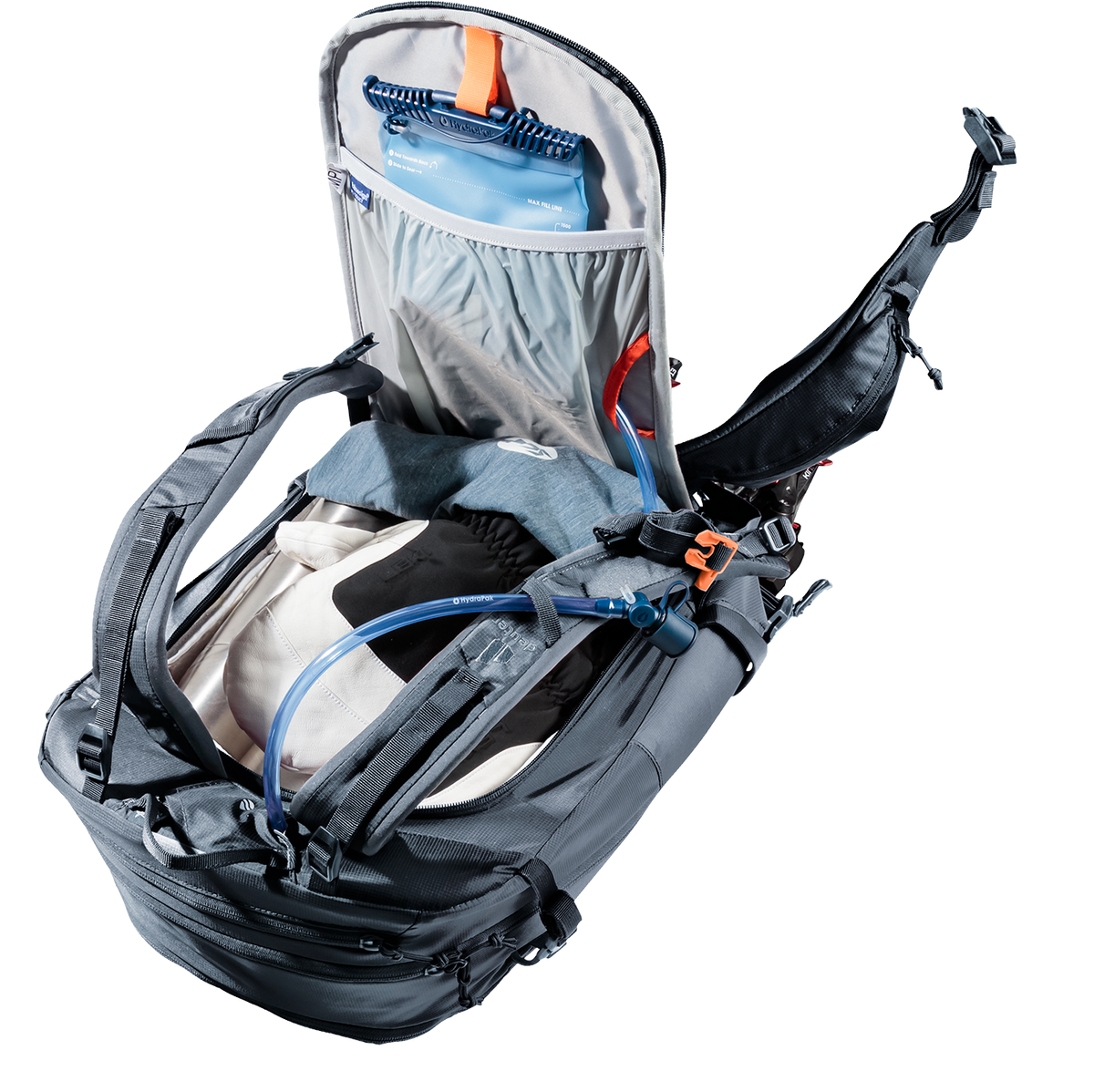 Deuter Freerider 22 SL opened through the rear clamshell zip with a hydration bladder and kit inside