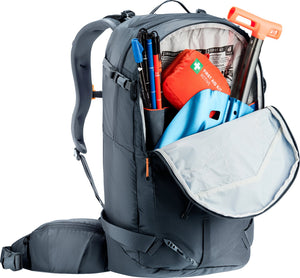Deuter Freerider 30 front pocket open with a shovel blade, probe and first aid kit