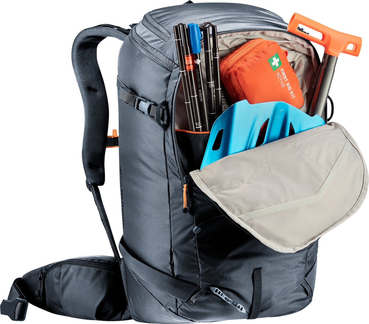 Deuter Freerider Pro 30+10 SL avalanche pocket open with a shovel blade, probe and first aid kit