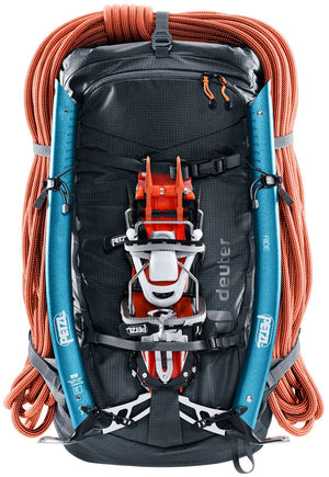 Deuter Freescape Lite 26 loaded with a rope, two ice axes and crampons on the outside