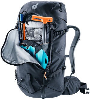 Deuter Freescape Tour 30 SL avalanche pocket open, holding a shovel and probe