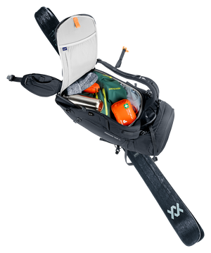 Deuter Freescape Tour 32 rear opening unzipped with a ski still attached
