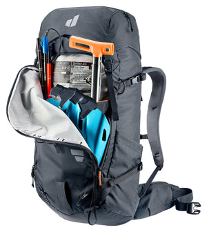 Deuter Freescape Tour 40 front avalanche pocket open with a shovel, probe and first aid kit