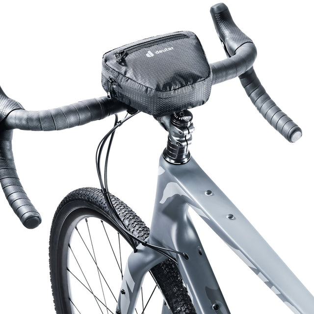 Deuter Front Bag 1.2 strapped to the centre of the drop handlebars of a grey gravel bike, above the stem