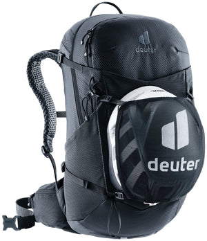 Deuter Futura 25 SL carrying a helmet in the Deuter mesh helmet holder, sold separately