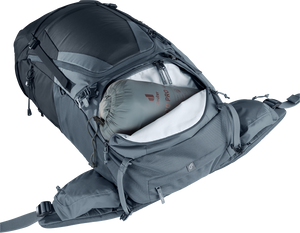 Deuter Futura Air Trek 55+10 SL lower zip open with a sleeping bag below the divider