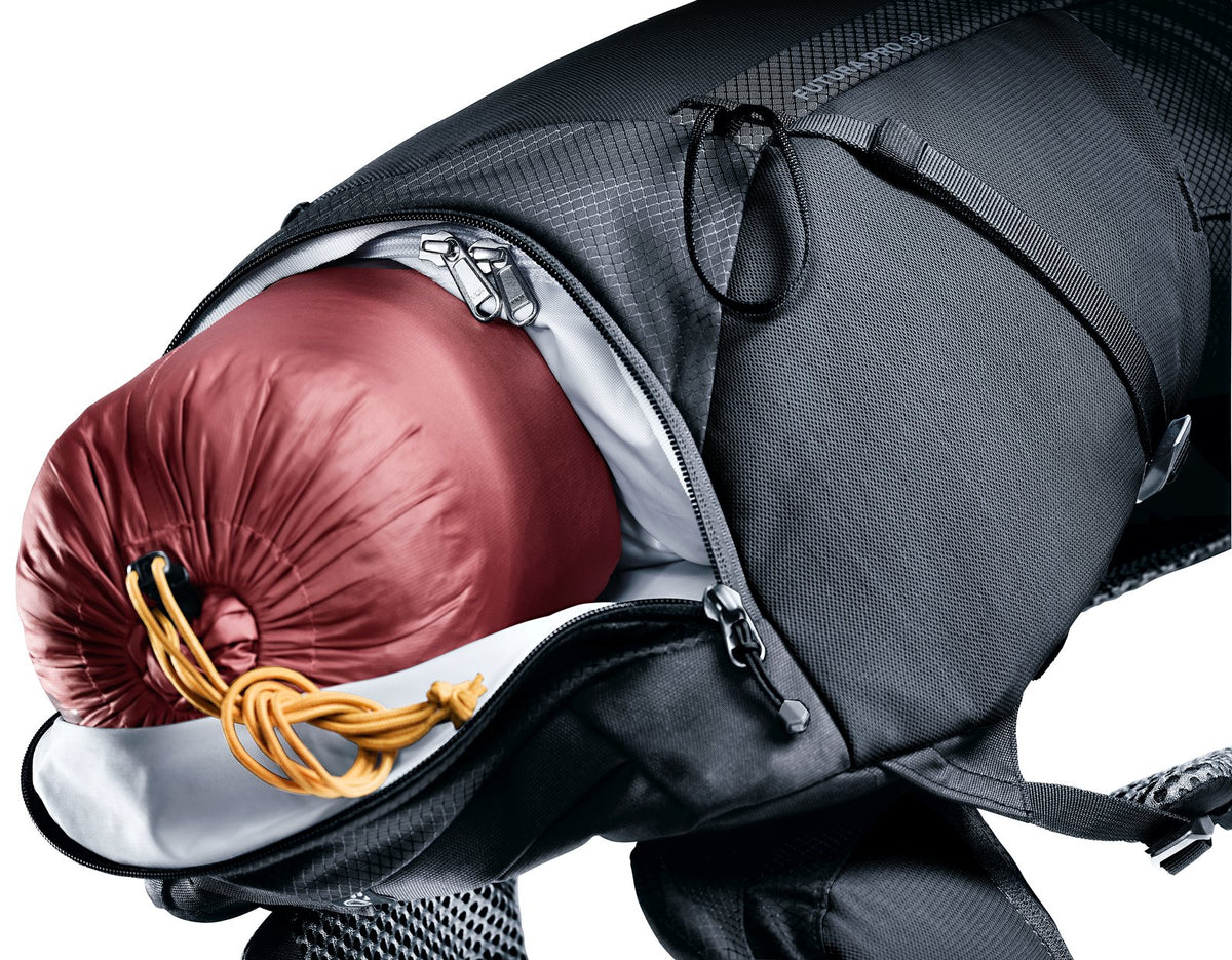 Deuter Futura Pro 32 bottom compartment unzipped with a sleeping bag inside