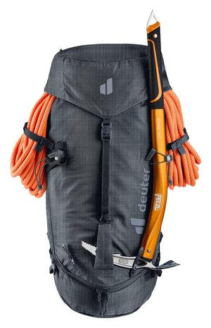 Deuter Guide 32+6 SL in Black with a coiled rope strapped across the front and an ice axe on the front