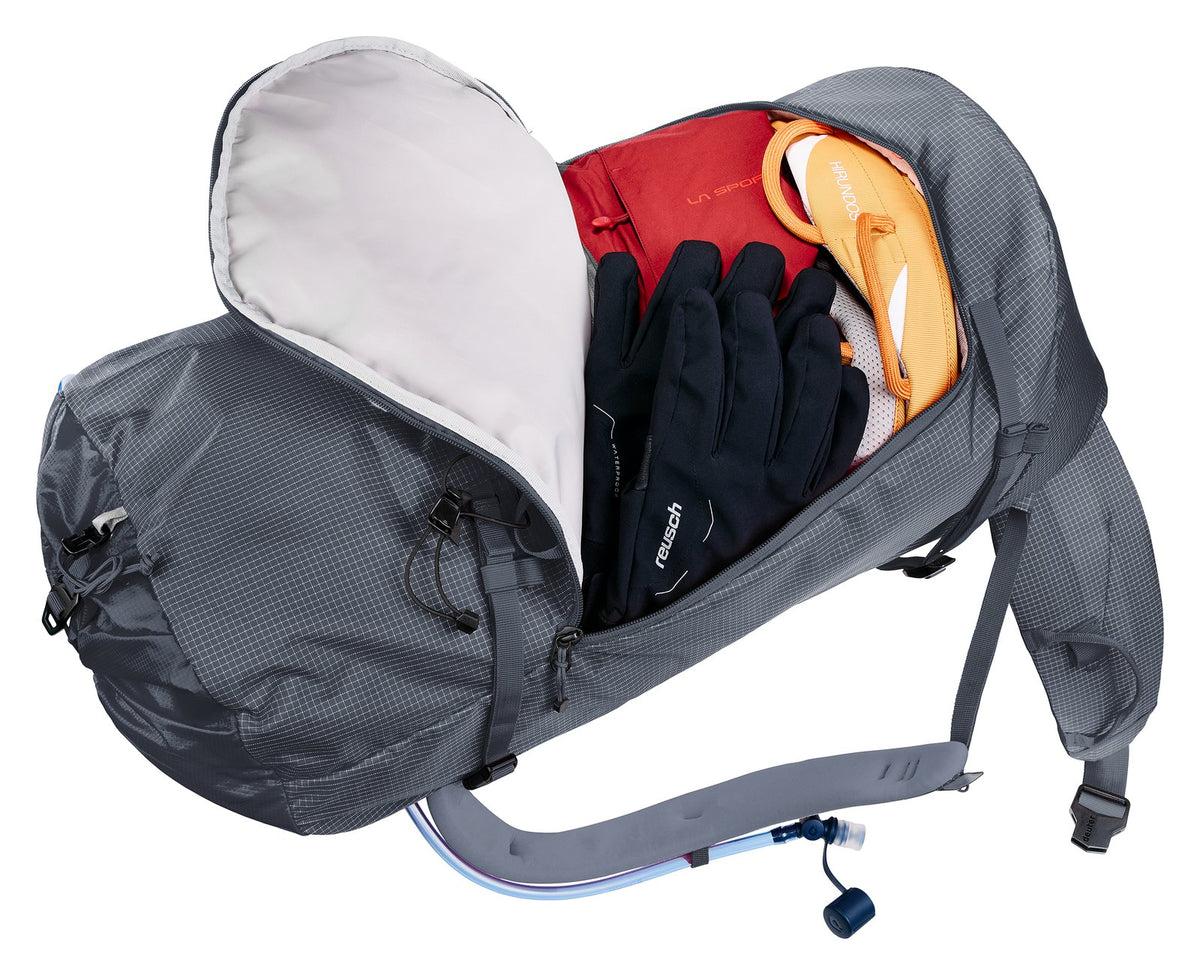 Deuter Guide 44+6 opened at the J-shaped front zip with gloves and layers inside