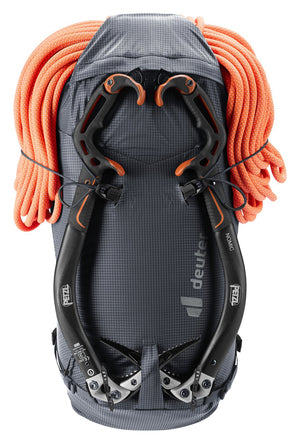 Deuter Guide Lite 30 carrying an orange rope under the rope strap and two ice axes