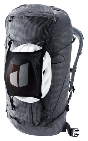 Deuter Guide Lite 30 with a helmet in its detachable mesh helmet holder