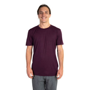 Front shot of Ottie Merino men's Plum short sleeve merino wool t-shirt on 173cm model who is wearing a size medium