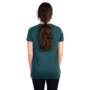 Back shot of Ottie Merino women's Otway Fern short sleeve merino wool t-shirt on 166cm model who is wearing a size small
